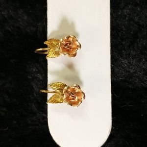 Rose gold krementz screw back earrings.